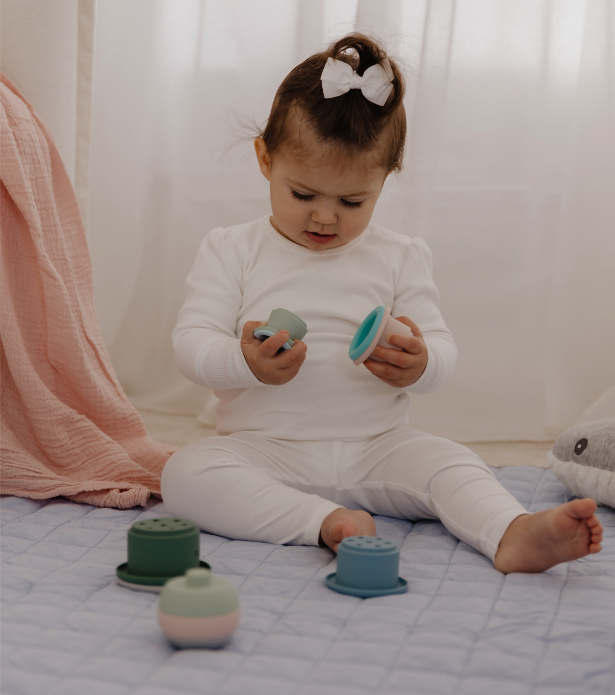 Baby playing with toys